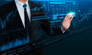 businessman trading stock by futuristic screen interface