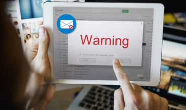 scam warning on tablet
