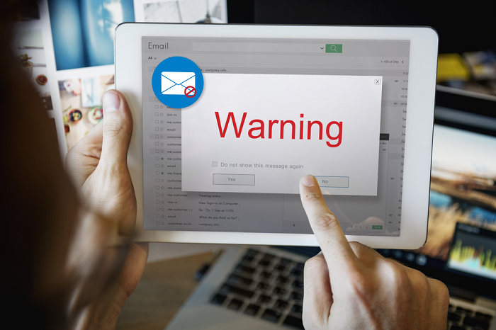 scam warning on tablet